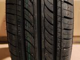 a close up of a tire on a wooden surface