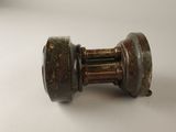 a close up of a metal knob on a table