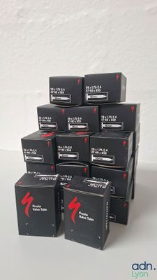 several boxes stacked on top of each other on a white surface