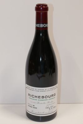 a bottle of wine that is sitting on a table