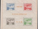 a close up of a stamp with four different stamps on it