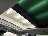 the interior of a car with the sunroof down and the sunroof down