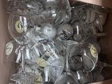 a box full of wine glasses with labels on them