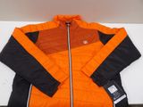 an orange and black jacket sitting on top of a white table