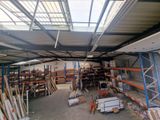 a large warehouse filled with lots of shelves and pallets