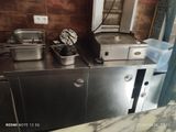 a kitchen with a lot of food on the counter