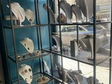 a display case with many different types of jewelry on it