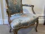 a chair that is sitting in the corner of a room