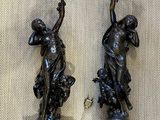 pair of antique bronze wall sconces with female figures on them