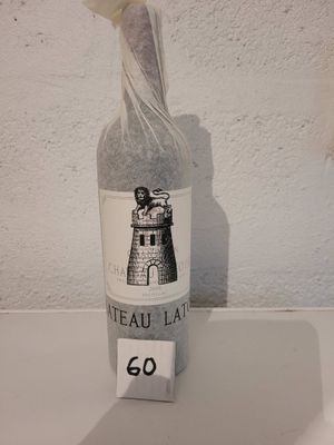 a bottle of wine that is sitting on a table