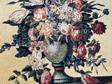 a painting of a vase of flowers on a table