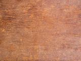 a close up of a piece of wood with some paint on it