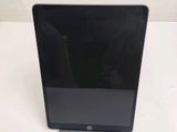 a tablet that is sitting on a table in the room