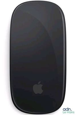 an apple mouse is shown on a white surface with a black background