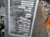 a sign on the side of a parking meter