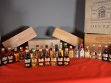 several bottles of liquor are lined up on a table