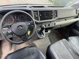 a dashboard of a car with a steering wheel and a dash board