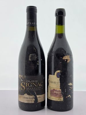 deux bouteilles de vin posées l'une à côté de l'autre sur une table