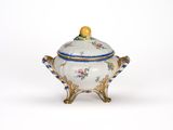 an image of a white and blue tureeny with flowers on it