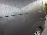 a van that is parked on the side of the road