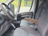 the interior of a van with the driver ' s seat folded down