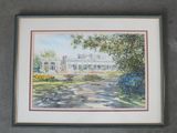 framed watercolor painting of a house in a garden with trees and flowers