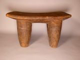 an image of a small wooden stool with two legs on a white background