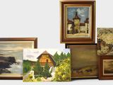 a lot of paintings that are on the wall