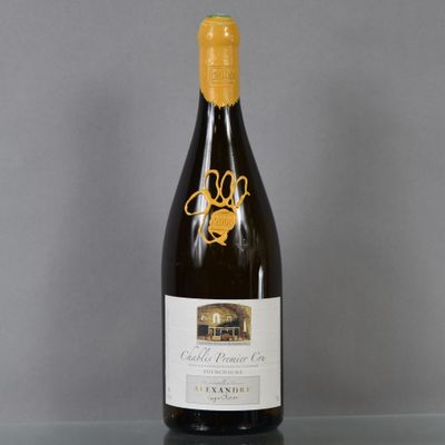 a bottle of wine that is sitting on a table