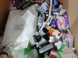 a cardboard box filled with lots of different types of items