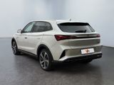 the rear end of a white suv parked in a room