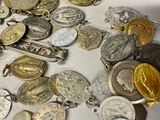 a lot of coins that are sitting on a table