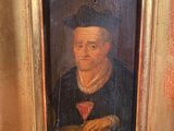 an old painting of a man in a black shirt and a red tie