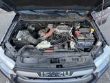 the engine of a car with its hood open and the hood open