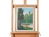 une photo d'un tableau accroché à un chevalet en bois
