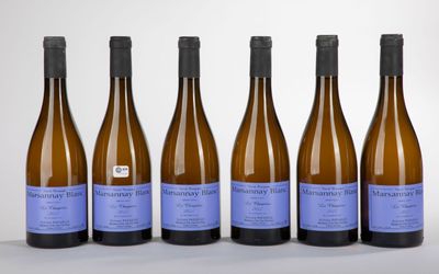 six bottles of wine are lined up in a row
