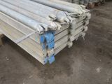 a pile of steel rods stacked on top of each other