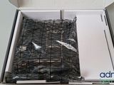 a white box with a black bag inside of it
