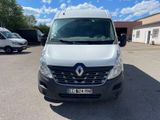 the white van is parked in the parking lot near other vehicles