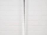 the floor lamp has a blue shade on it and is on a wooden floor