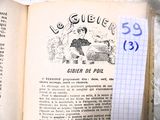 un livre ouvert sur lequel figure l'image d'une femme assise sur un banc
