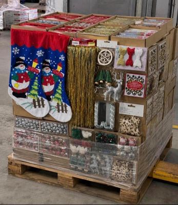 a pallet with a bunch of christmas decorations on it