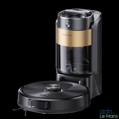 une image représentant une cafetière noire et dorée sur fond noir
