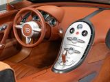 the interior of a sports car with a leather seat and dashboard