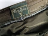 the inside of a green bag with a label on it