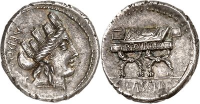 a silver coin with an image of a woman on it