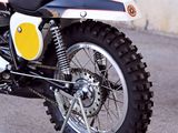 a motorcycle that is parked on the side of the street