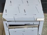 a stack of boxes sitting on top of each other on the floor