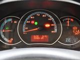 a close up of a car dashboard with a speedometer