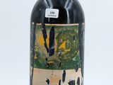 a bottle of wine that is sitting on a table